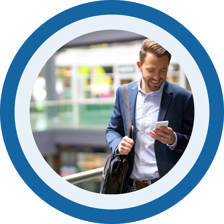 A business owner reading a customer's WhatsApp message while out of the office