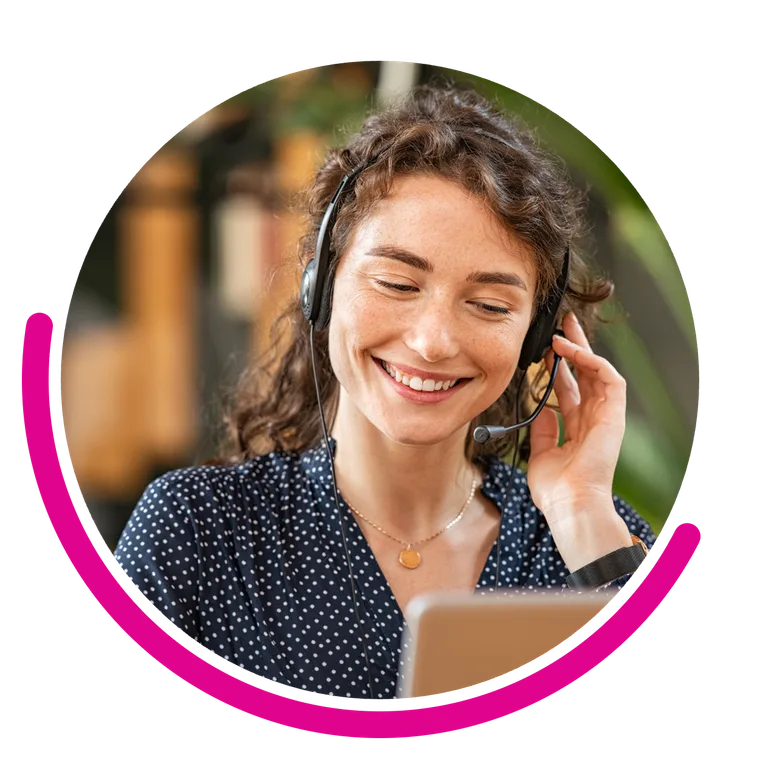 An agent on a headset taking the next call in the queue